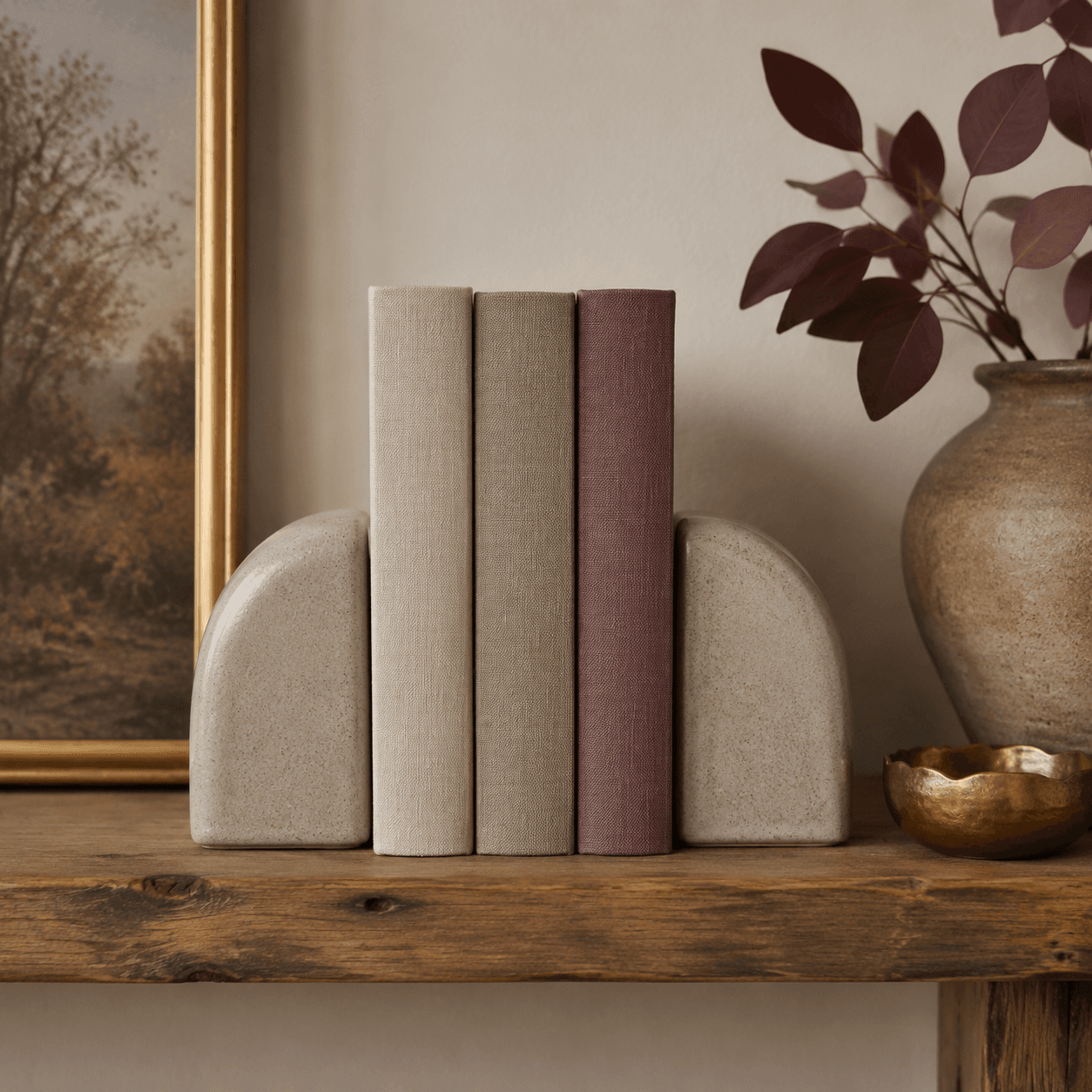 A pair of weighted limestone-look bookends for a steady reading corner.